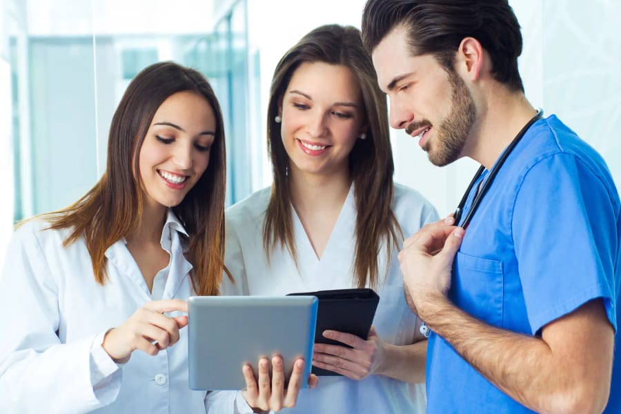 Support workers reviewing roles together